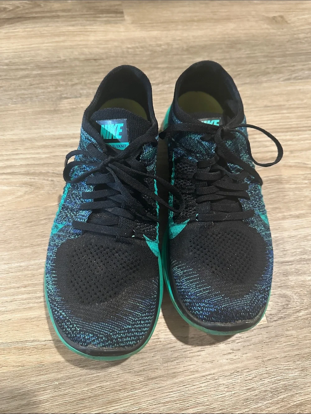 Nike Black & Teal Flyknit Athletic Sneakers